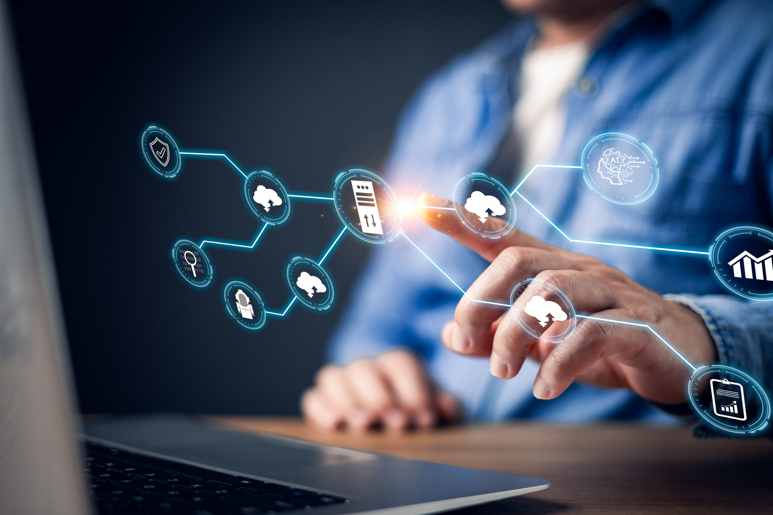 person interacts with a futuristic digital interface displaying interconnected cloud computing and data network icons, symbolizing technology integration, cybersecurity, and AI driven cloud services.
